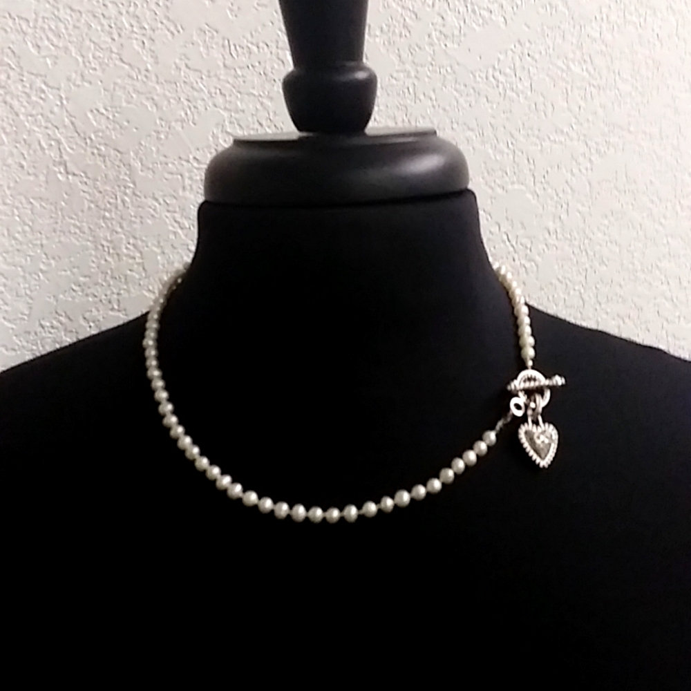 Faux pearls with silver toned heart toggle clasp
